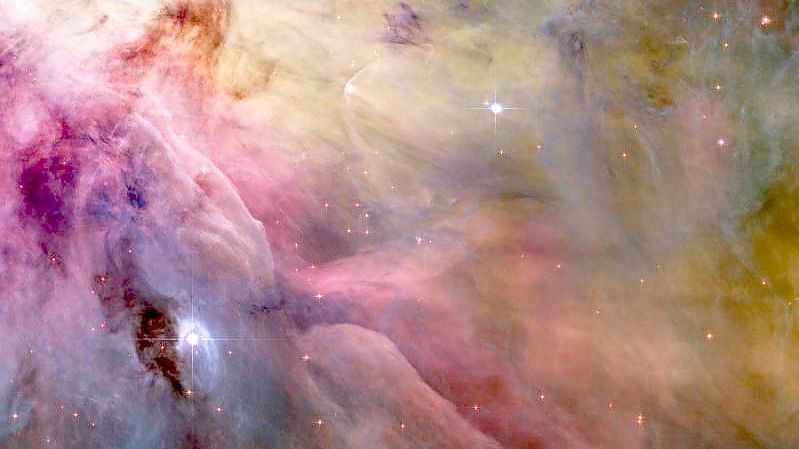 Der Stern LL Orionis zusammen mit dem Orionnebel. Foto: NASA/ESA/dpa