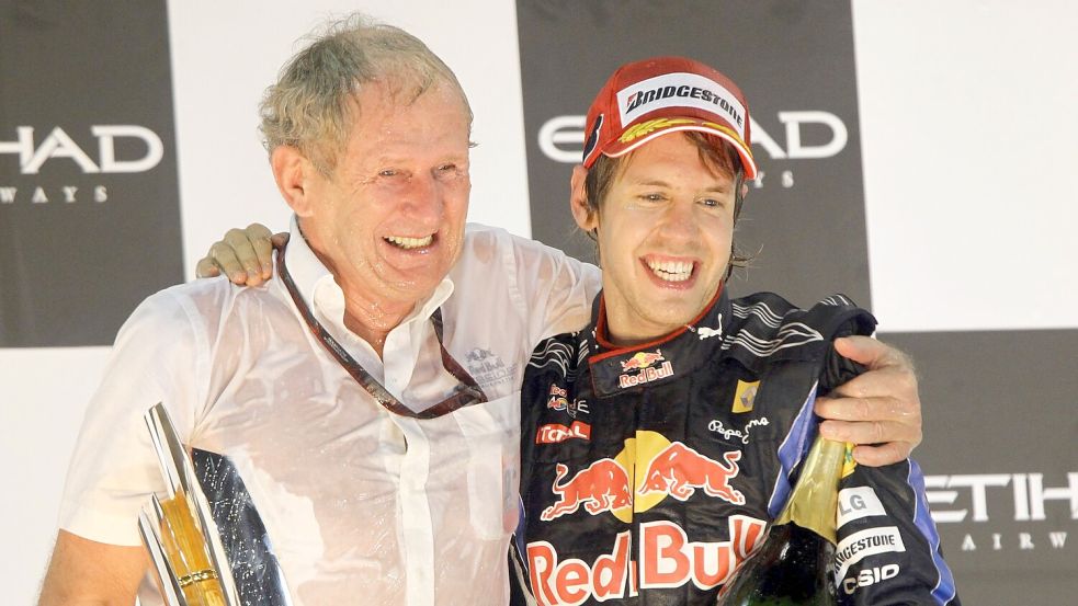 Sebastian Vettel (r) im Jahr 2010 mit Helmut Marko. Foto: Jens Büttner/DPA/dpa/Archiv