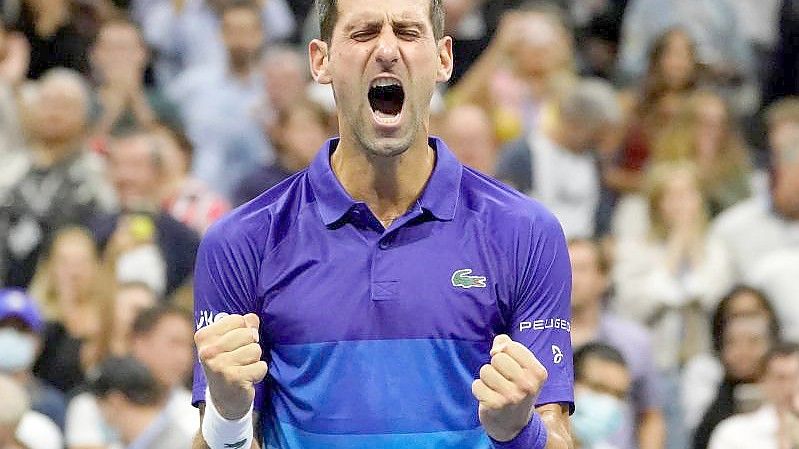 Novak Djokovic im Moment seines Sieges. Foto: Elise Amendola/AP/dpa