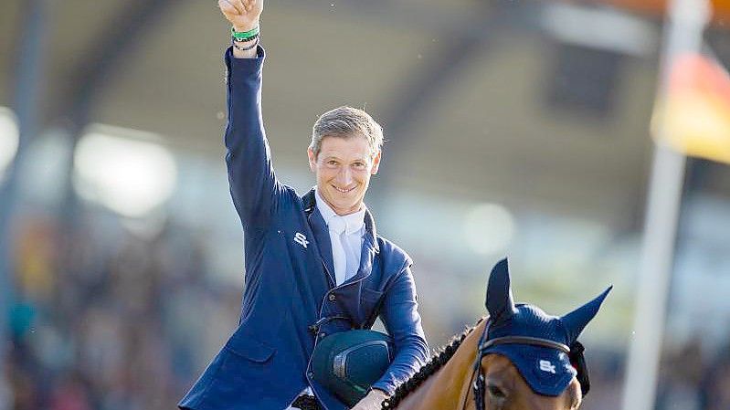 Gewann beim CHIO in Aachen: Daniel Deußer auf seinem Pferd Killer Queen. Foto: Rolf Vennenbernd/dpa