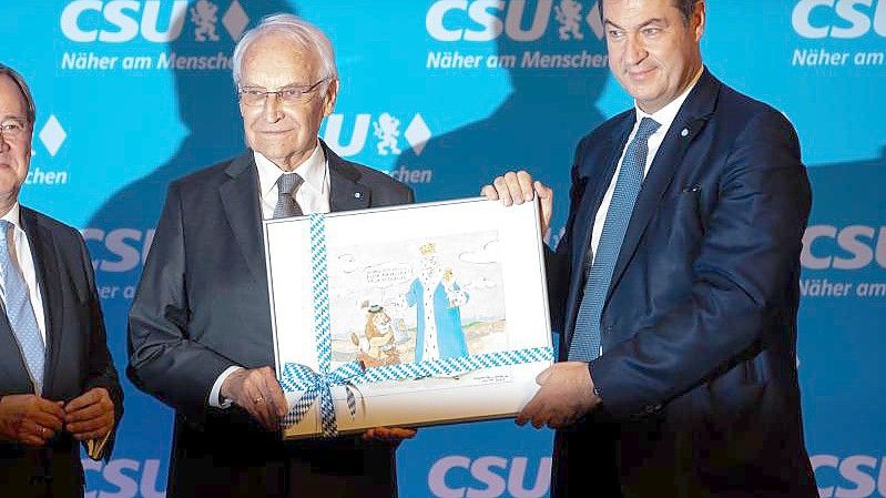 Armin Laschet (l), Edmund Stoiber (M) und Markus Söder in München. Foto: Sven Hoppe/dpa