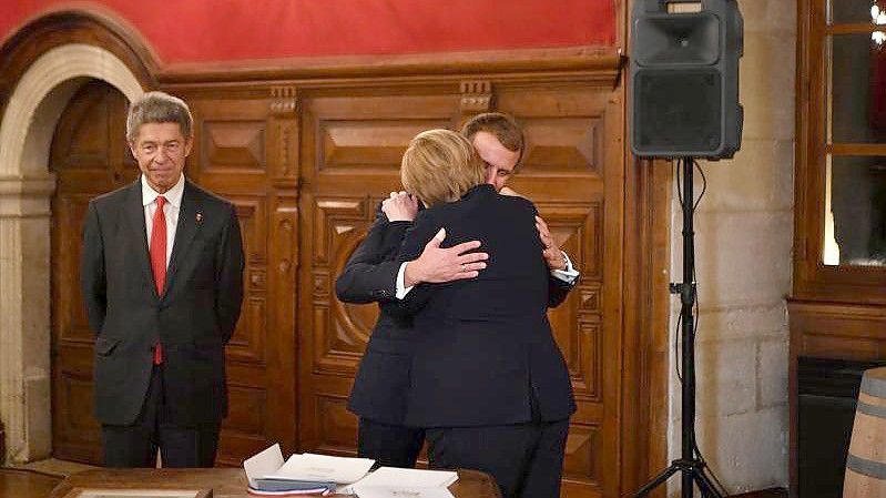 Merkel stattete Frankreich am Mittwoch einen Abschiedsbesuch ab. Foto: Philippe Desmazes/AFP POOL via AP/dpa