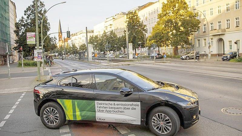 Uber verbucht kräftiges Wachstum. Foto: Carsten Koall/dpa