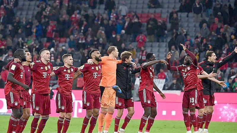 Die Bayern-Spieler hatten gegen Freiburg gleich mehrer Grüne zum Feiern. Foto: Sven Hoppe/dpa