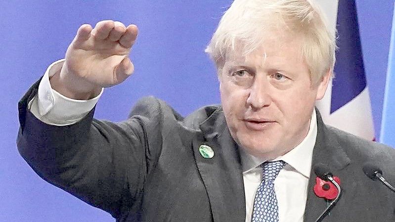 Boris Johnson fordert die Teilnehmer des Klimagipfels auf, an einem Strang zu ziehen. Foto: Stefan Rousseau/PA Wire/dpa