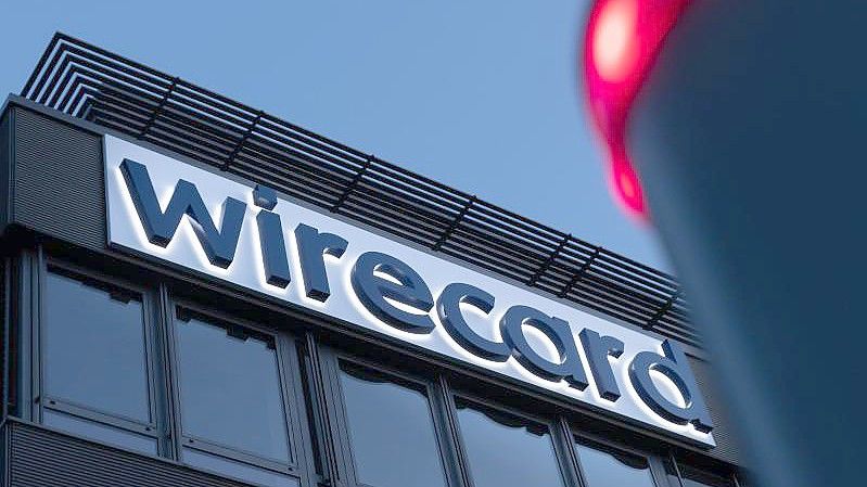 Der Schriftzug von Wirecard ist an der damaligen Firmenzentrale des Zahlungsdienstleisters in Aschbeim bei München zu sehen. Foto: Peter Kneffel/dpa