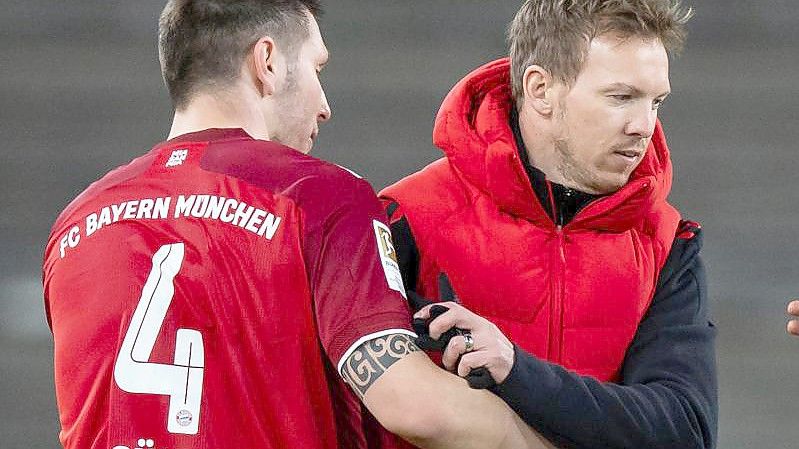 Bayerns Trainer Julian Nagelsmann (r) und Niklas Süle. Foto: Tom Weller/dpa