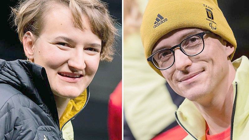 Anna-Lena Forster und Martin Fleig bei der Präsentation der Bekleidung Team Deutschland für die Winterspiele in Peking 2022. Foto: Rolf Vennenbernd/dpa