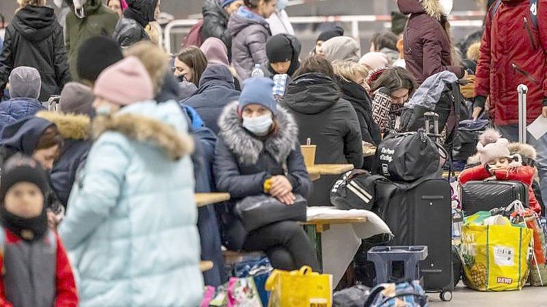 Anlaufstelle für Flüchtlinge aus der Ukraine auf dem Berliner Hauptbahnhof. Foto: Hannibal Hanschke/dpa