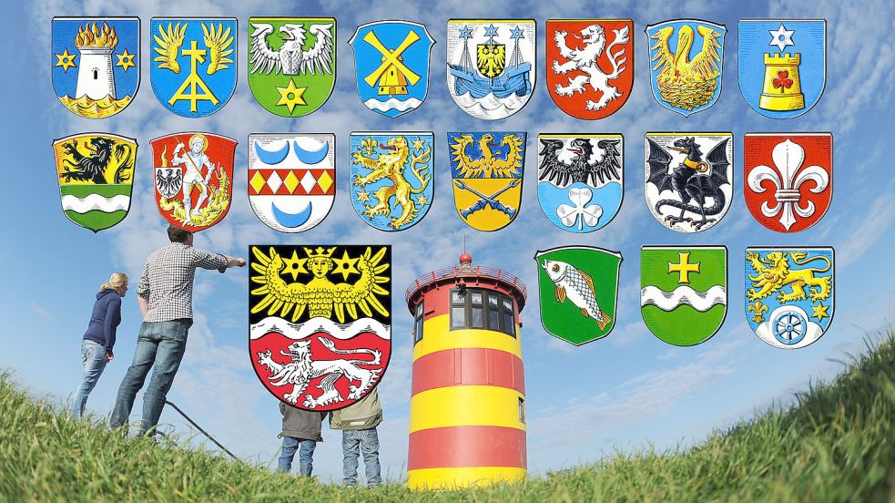 Hier sind das Wappen der Gemeinde Krummhörn sowie die 19 Ortswappen vor den Pilsumer Leuchtturm montiert. Foto: Stratenschulte/dpa // Montage: Hock