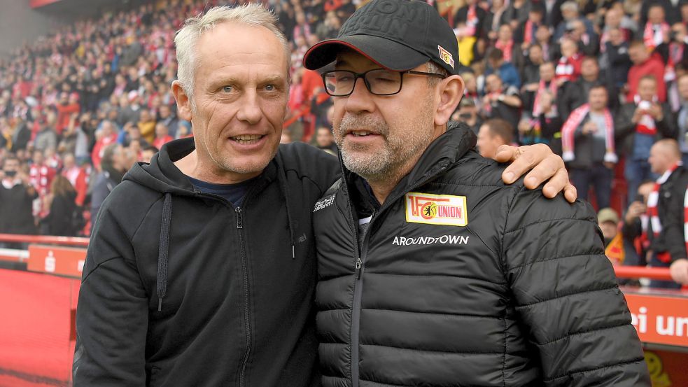 Ärgern die etablierten Spitzenteams der Bundesliga: Christian Streich (links), Trainer des SC Freiburg und Urs Fischer von Union Berlin. Foto: dpa/Monika Skolimowska