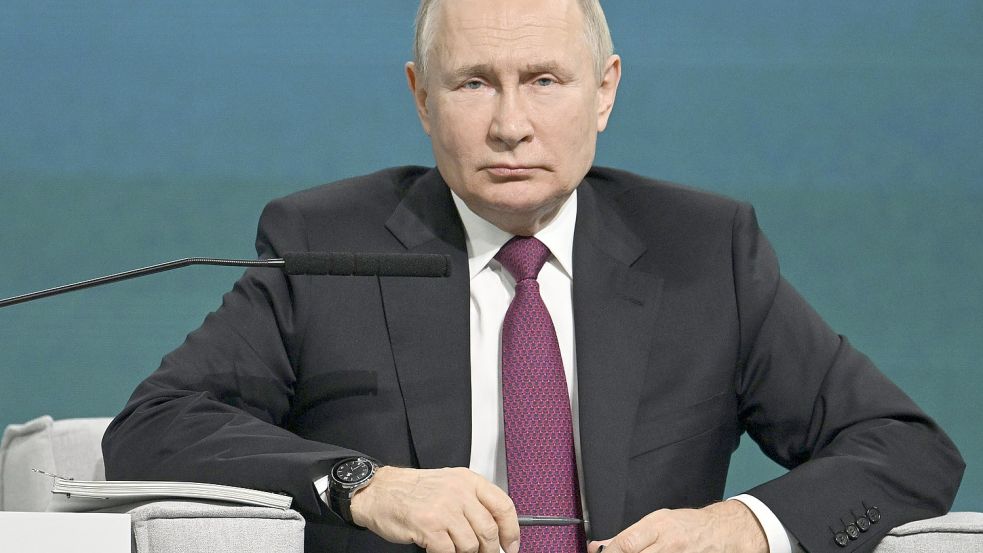 Russlands Präsident Putin ist erfreut über Deepfakes von Olaf Scholz. Foto: dpa/Pavel Bednyakov