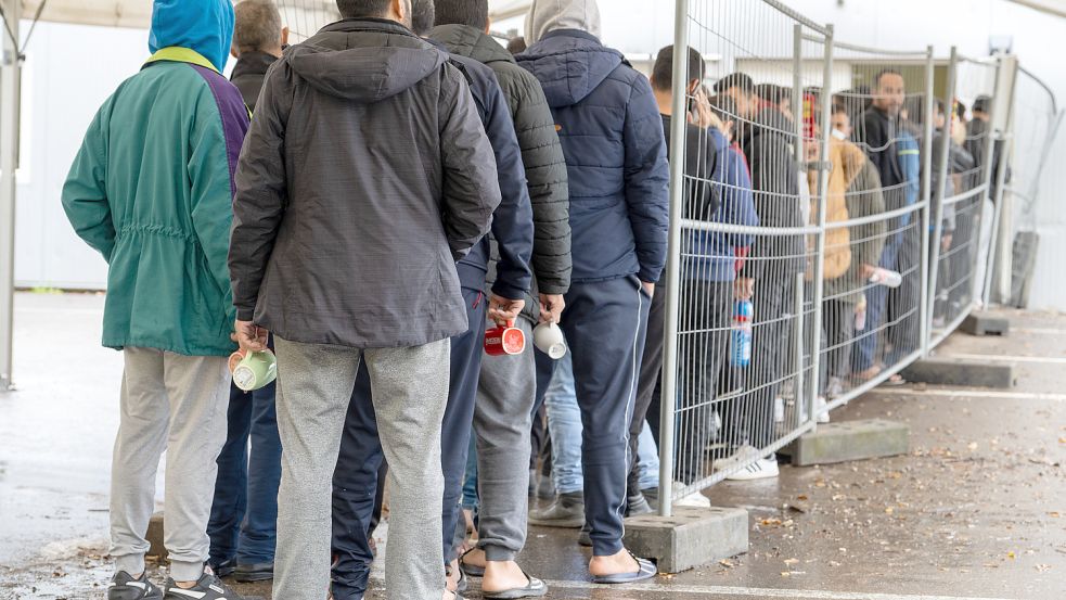 Ankommende in einer Flüchtlingsunterkunft in Baden-Württemberg Foto: dpa