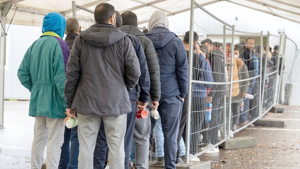 Ankommende in einer Flüchtlingsunterkunft in Baden-Württemberg Foto: DPA