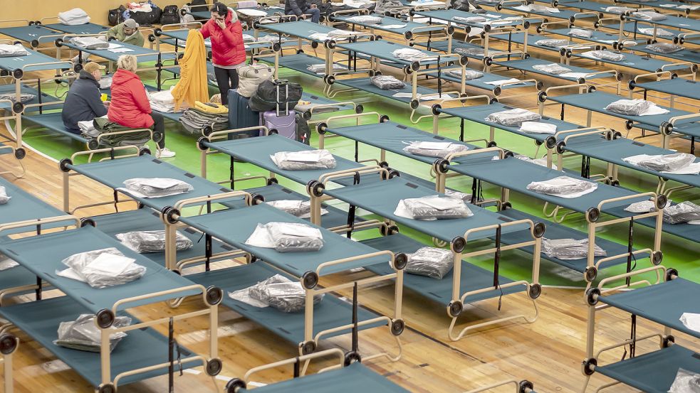 Blick in eine Sammelunterkunft für Flüchtlinge: Das Land Niedersachsen will 5000 Doppelstockbetten beschaffen, auf denen Menschen in Not schlafen sollen. Foto: dpa-Zentralbild