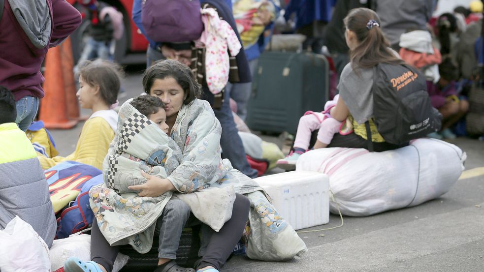 Auf der Flucht: Derzeit verlassen sehr viele Kolumbianer und Venezolaner ihre Heimatländer. Foto: dpa/AP/Dolores Ochoa
