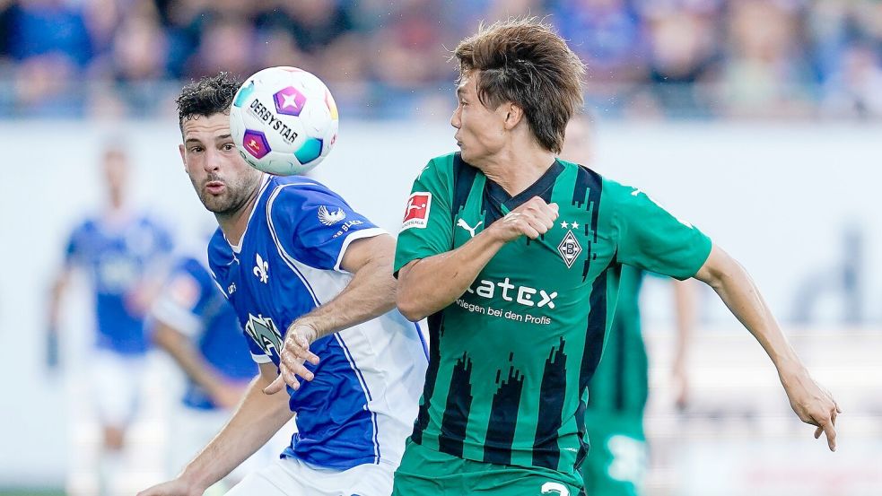 In einer ereignisreichen Partie trennten sich der SV Darmstadt und Borussia Mönchengladbach 3:3. Foto: Uwe Anspach/dpa