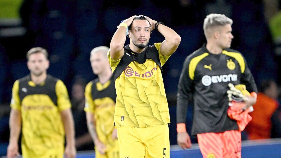 Die Dortmunder Spieler haben den Champions-League-Start in Paris verpatzt. Foto: Federico Gambarini/dpa