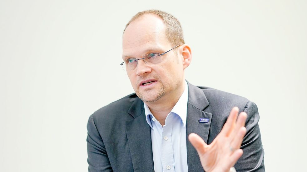 „Wir werden das US-Geschäft weiter absichern, fortführen und ausbauen“, sagt BASF-Finanzchef Dirk Elvermann. Foto: Uwe Anspach/dpa