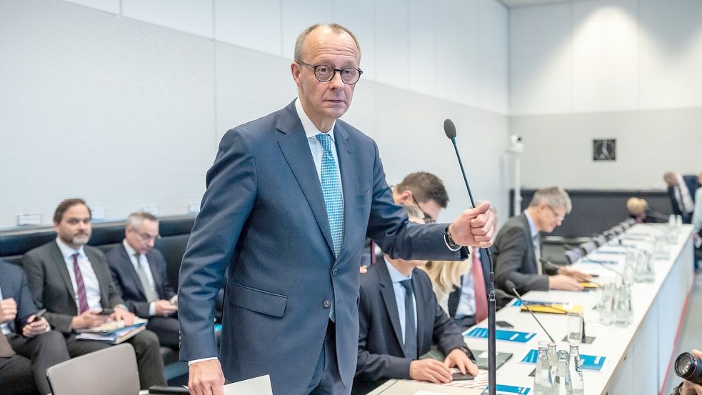 CDU-Chef Merz sieht das Vertrauen zwischen Union und SPD wachsen. Foto: Michael Kappeler/dpa
