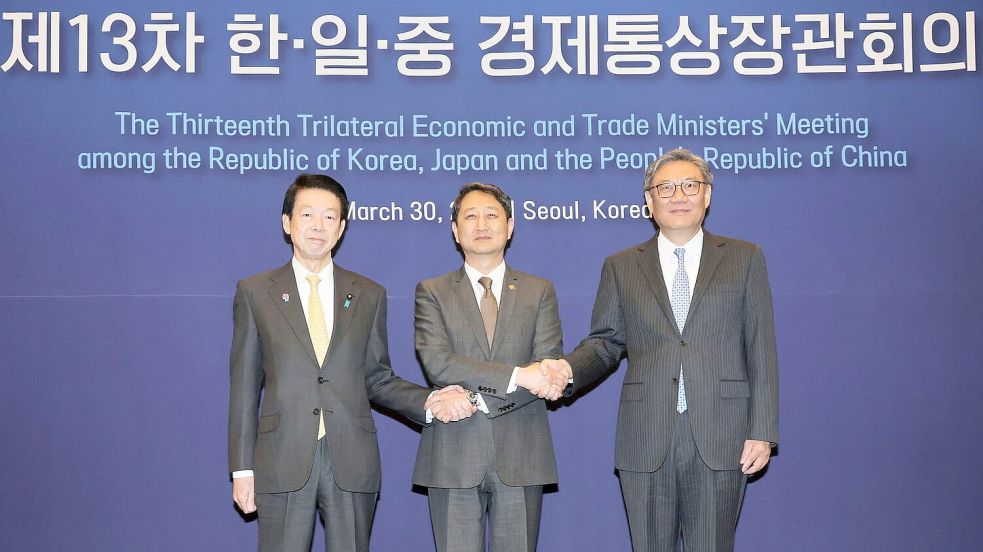 Die Handelsminister Südkoreas, Japans und Chinas haben über Freihandel gesprochen. Foto: Lee Jung-hoon/Yonhap via AP/dpa