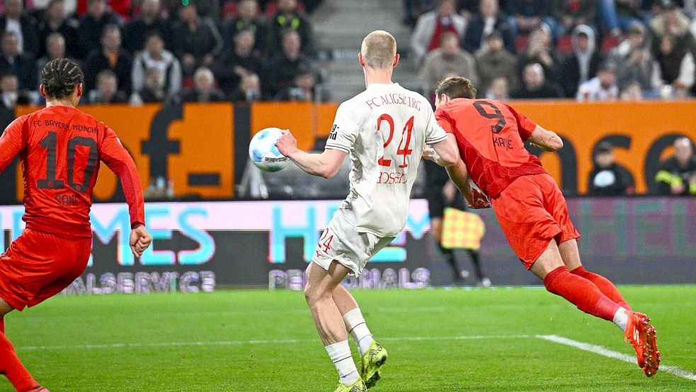 Harry Kane (r.) köpft das 2:1 für den FC Bayern. Foto: Tom Weller/dpa
