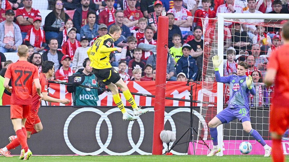 Maxi Beier köpfte zur BVB-Führung ein. Foto: Tom Weller/dpa
