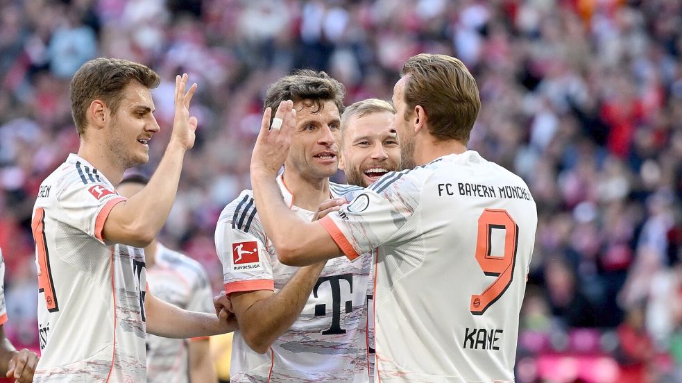 Harry Kane (r) erzielt den Treffer zum 1:0. Foto: Sven Hoppe/dpa