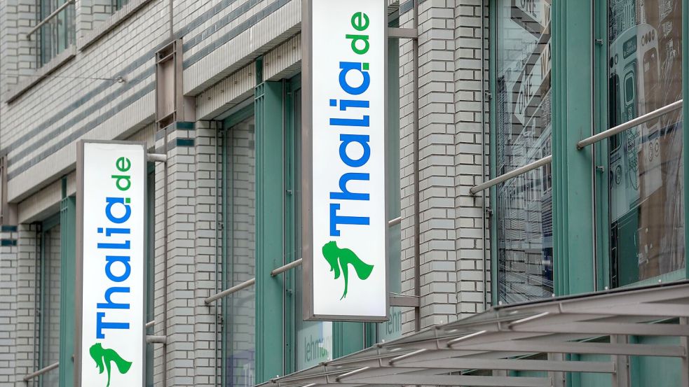 Das Thalia-Logo an einer Filiale der Buchhandelskette. Foto: Marcus Brandt/dpa