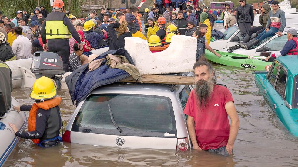 Ganze Landstriche sind überflutet. Foto: Rodrigo Abd/AP/dpa