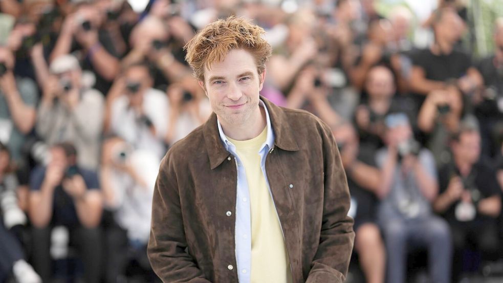 Robert Pattinson ist an der Seite von Jennifer Lawrence im Film zu sehen. Foto: Scott A Garfitt/Invision/AP/dpa
