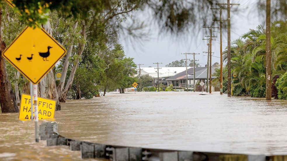 Straßen wurden völlig überschwemmt, Tausende sind ohne Strom. Foto: Lindsay Moller/AAP/dpa