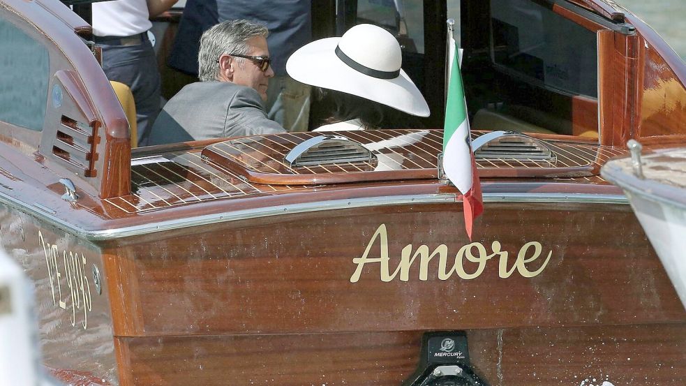 Auch Amal und George Clooney haben in Venedig geheiratet. (Archivbild) Foto: picture alliance / Alessandro Di Meo/ANSA/dpa