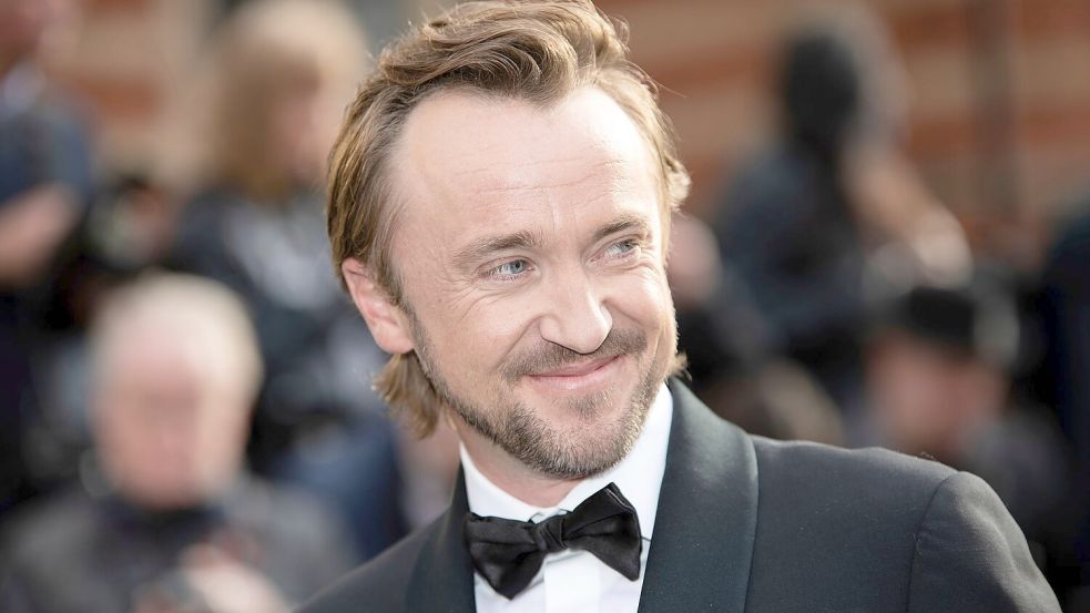 Berühmt wurde er als der blonde Erzrivale Draco Malfoy: Tom Felton kehrt ins Harry-Potter-Universum zurück. (Archivbild) Foto: Vianney Le Caer/Invision via AP/dpa