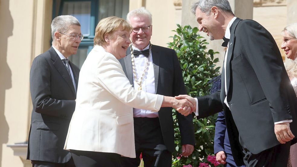 Angela Merkel in Bayreuth. Foto: Karl-Josef Hildenbrand/dpa