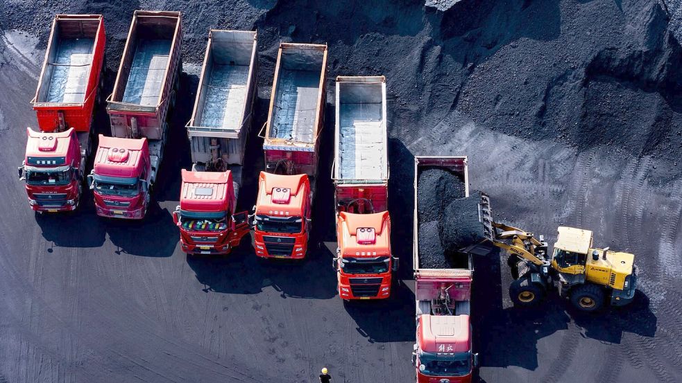 China sieht Kohle als Rückhalt bei Stromengpässen aus erneuerbaren Energien. (Symbolbild) Foto: Uncredited/CHINATOPIX/AP/dpa