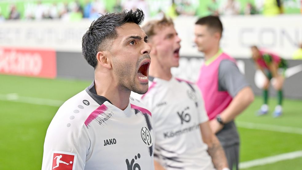 Nadiem Amiri schreit seine Freude über den späten Ausgleich heraus. Foto: Swen Pförtner/dpa