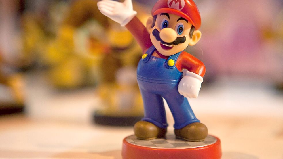 Unverkennbar mit seiner blauen Latzhose und dem roten Hemd: „Super Mario“ begeistert seit nunmehr 40 Jahren Kinder und Erwachsene. Foto: Sebastien Berda / AFP