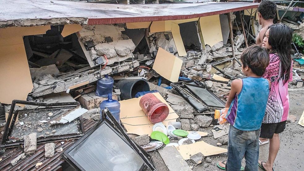 Viele Menschen verloren ihre Häuser. Foto: Uncredited/AP/dpa