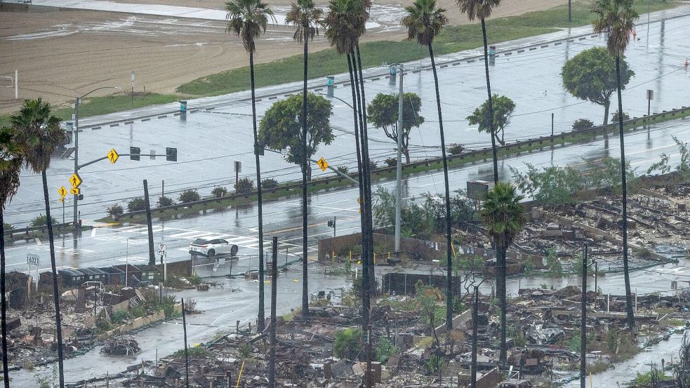 Die Behörden warnen von Sturzfluten und Überschwemmungen. Foto: Ethan Swope/AP/dpa