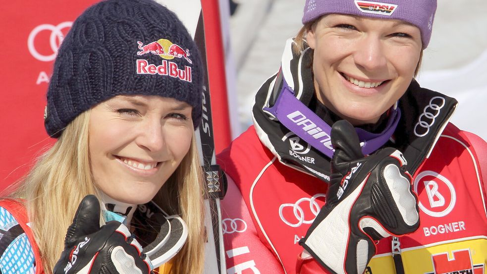 Maria Riesch (r) und Lindsey Vonn: Die Beziehung der beiden war nicht immer harmonisch. Foto: dpa/Stephan Jansen