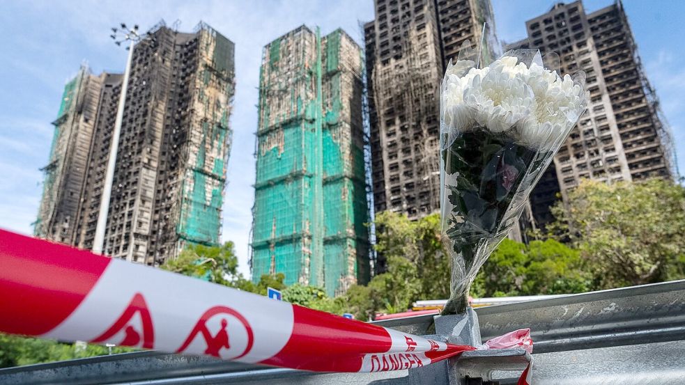 Die Zahl der Todesopfer den dritten Tag in Folge stieg weiter. Foto: Chan Long Hei/AP/dpa