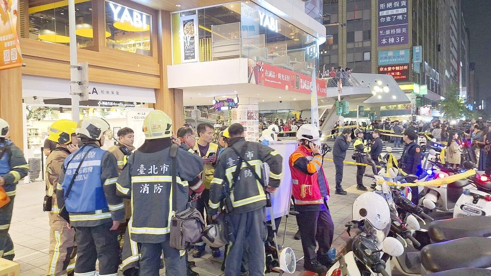 Mitten in Taipeh hat ein Mann mit Rauchgranaten und einem Messer Menschen angegriffen. Foto: Uncredited/kyodo/dpa