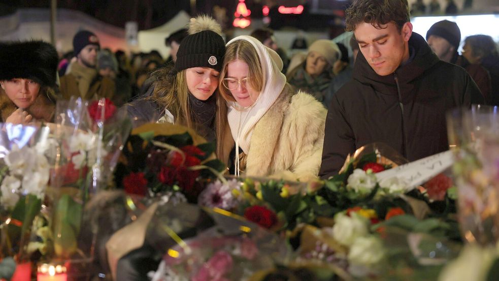 Fassungsosigkeit, Entsetzen, Trauer - die Menschen in Crans-Montana leiden. Foto: Imago/MAXPPP
