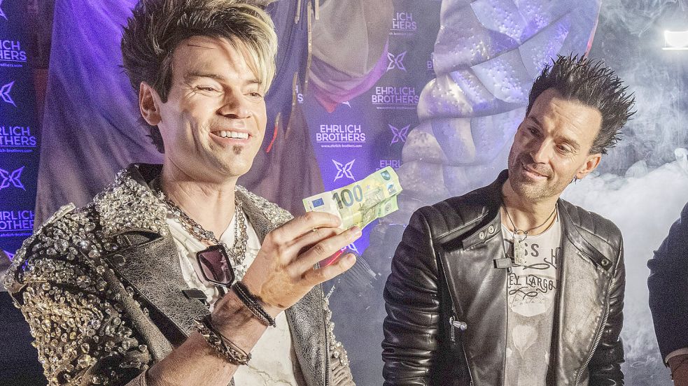 Chris Ehrlich, Hendrik Wüst, Andreas Ehrlich Foto: IMAGO/Future Image