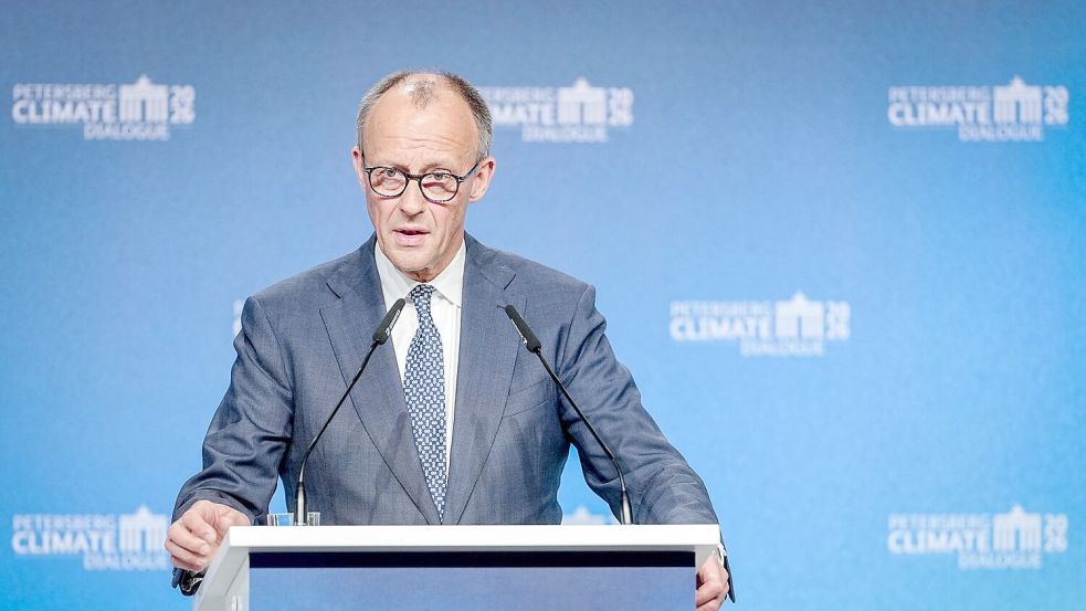 Bundeskanzler Merz betont Verlässlichkeit in der Klimapolitik. Foto: Kay Nietfeld/dpa