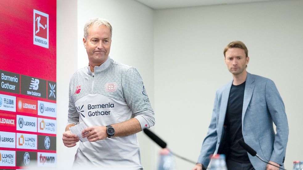 Zusammenarbeit endet: Hjulmand und Bayers Sportchef Rolfes. (Archivbild) Foto: Marius Becker