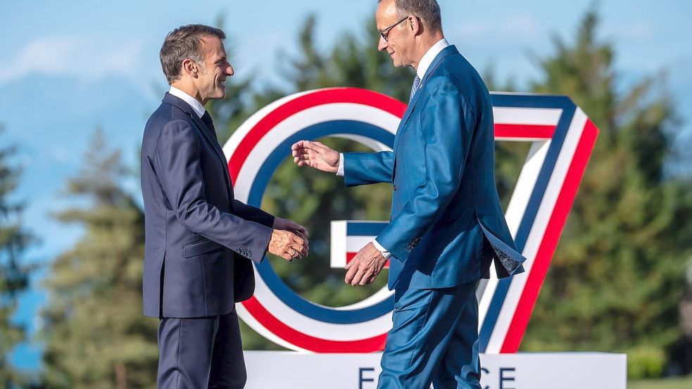 Macron und Merz spielen eine wesentliche Rolle bei der Vorbereitung des Einsatzes. Foto: Michael Kappeler/dpa-Pool/dpa
