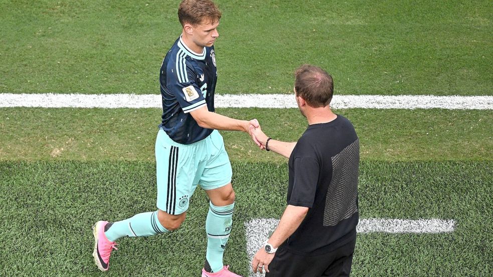 Kimmich und Nagelsmann wissen nun den Gegner. Foto: Tom Weller/dpa