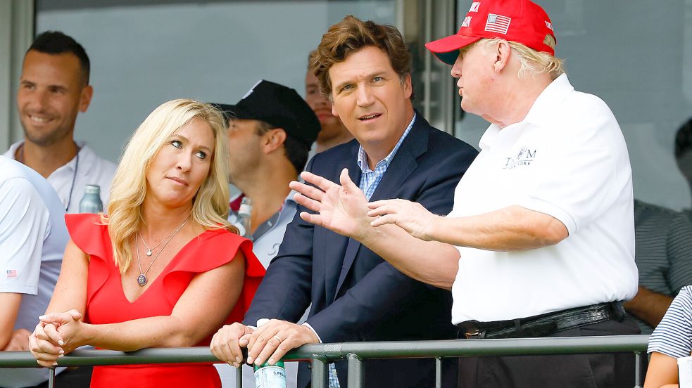 Hier war die Maga-Welt noch in Ordnung: 2022 besuchten Donald Trump und seine damaligen Verbündeten Tucker Carlson und Marjorie Taylor Greene ein Golfturnier in New Jersey. Foto: IMAGO / Icon Sportswire